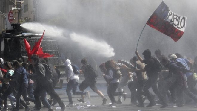   Police use water cannons on students protesting in Chile -    NO COMMENT    