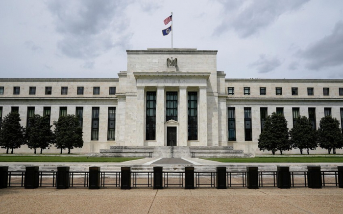 Fed signals further rate hikes and sees a slowing economy – but not recession