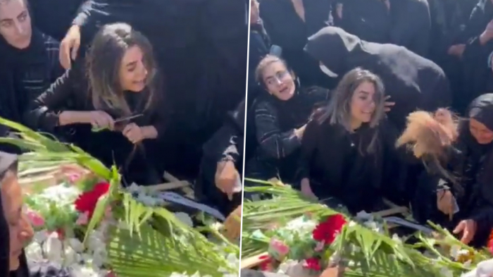   Grieving sister of Azerbaijani man killed in Iran protests chops hair at his funeral -   VIDEO    