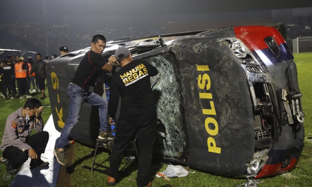 At least 174 dead after crowd crush at Indonesian football match