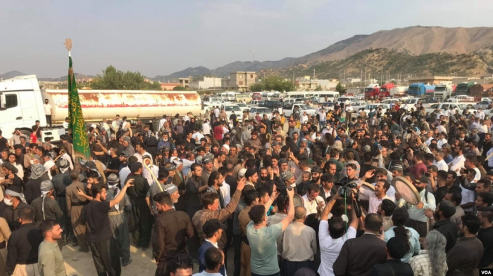 Iran protests: Police fire on Mahsa Amini mourners - witnesses