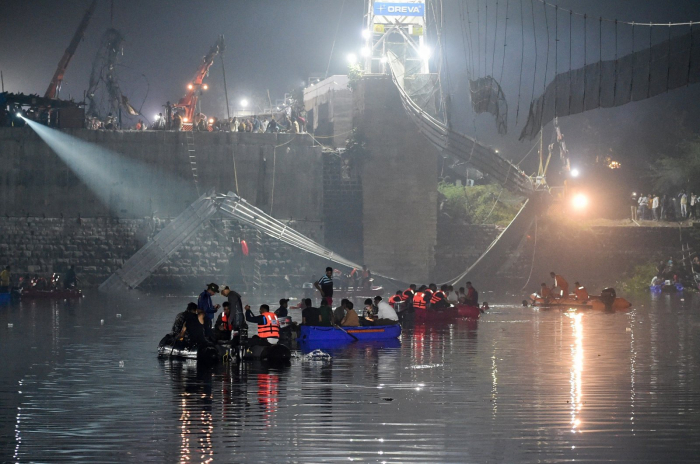   At least 141 dead in pedestrian bridge collapse in India  