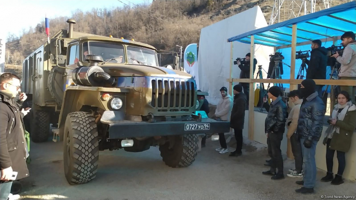   Several more supply vehicles of Russian peacekeepers pass freely along Lachin road  