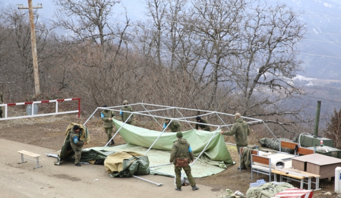  Russian peacekeepers dismantle tents they set up in area of protests on Lachin-Khankandi road 