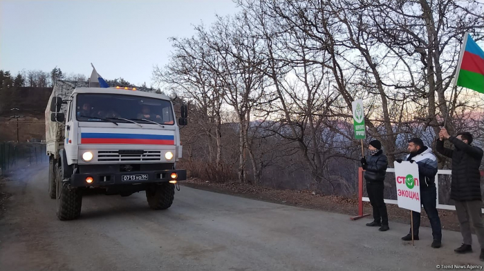   More vehicles of Russian peacekeepers freely pass along Lachin road   