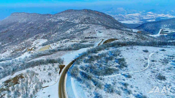    Ağ örpəyə bürünən "Zəfər yolu" -    FOTOLAR      