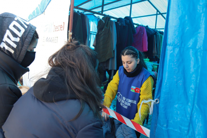 Azerbaijani volunteers build tents for children in quake-affected Turkish Malatya