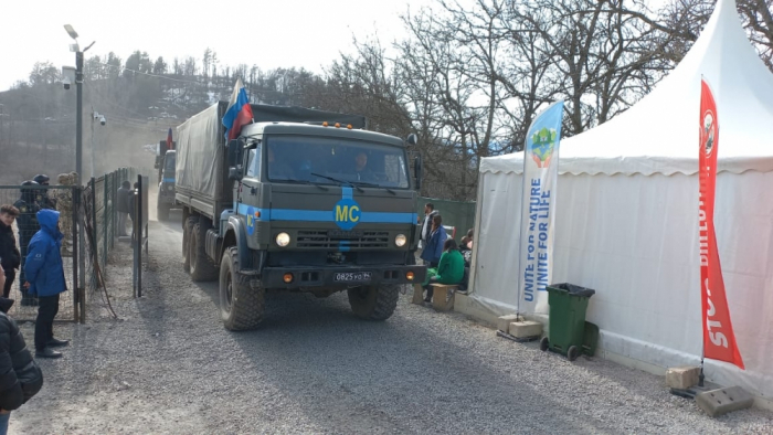   Lachin-Khankendi road: Another convoy of Russian peacekeepers moves freely through protest area  