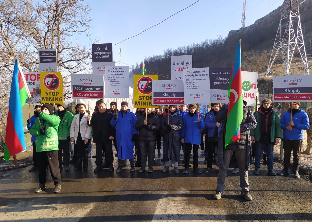   Azerbaijani peaceful protesters chant slogans about Khojaly genocide on Lachin-Khankendi road  