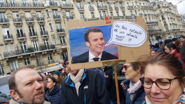   Nationwide demonstrations begin in Paris as thousands protest government pension reform plan  