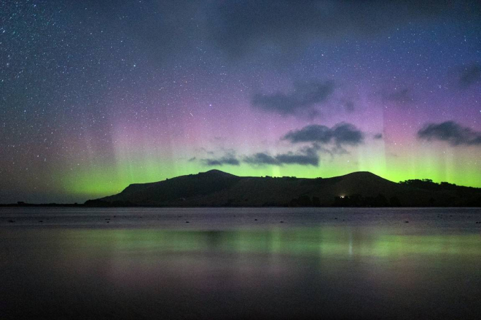 Unusually vivid Southern Lights glow over New Zealand
