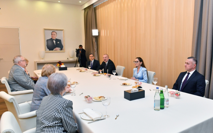 President Ilham Aliyev and First Lady Mehriban Aliyeva talk with ophthalmologists who worked at the same time with academician Zarifa Aliyeva