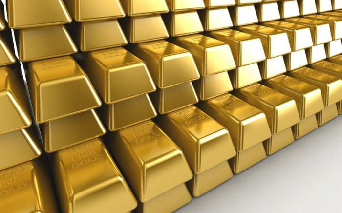 Gold prices hit record high after Fed’s meeting