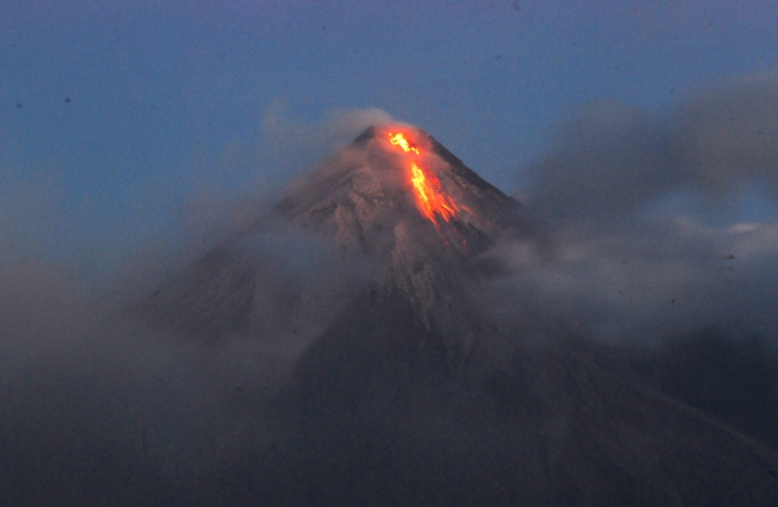 Mayon: Thousands evacuated as Philippine volcano oozes lava