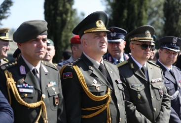   Employees of Azerbaijani embassy commemorate August war victims in Georgia  