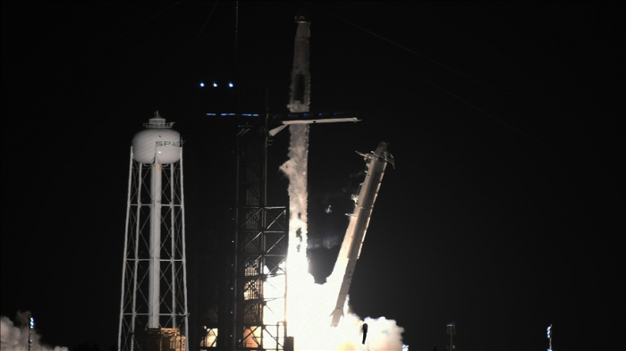  SpaceX capsule carrying 4 astronauts docks at International Space Station 