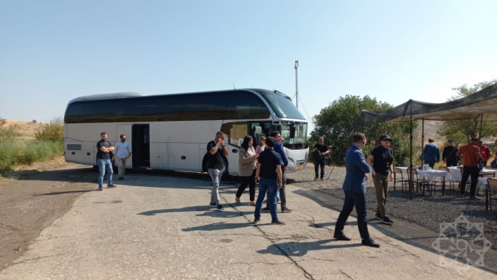   Representatives of diplomatic corps, military attachés, foreign journalists arrive on Aghdam-Khankendi road  