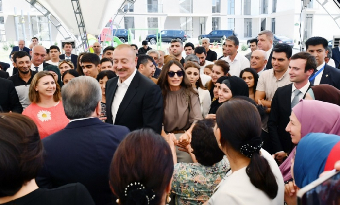  Azerbaijani, Uzbek presidents and their wives meet with residents of new residential complex in Fuzuli  