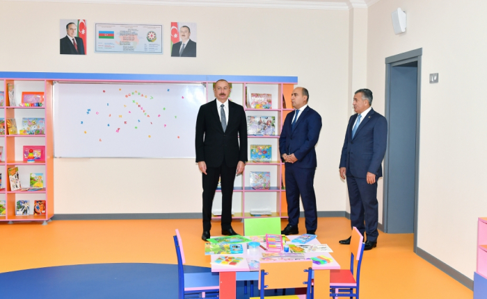   Le président Ilham Aliyev participe à l’inauguration d’un nouveau bâtiment de l’école secondaire n°11 de la ville de Khyrdalan  