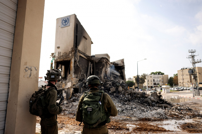 Israel drafts 300,000 reservists as it goes on the offensive