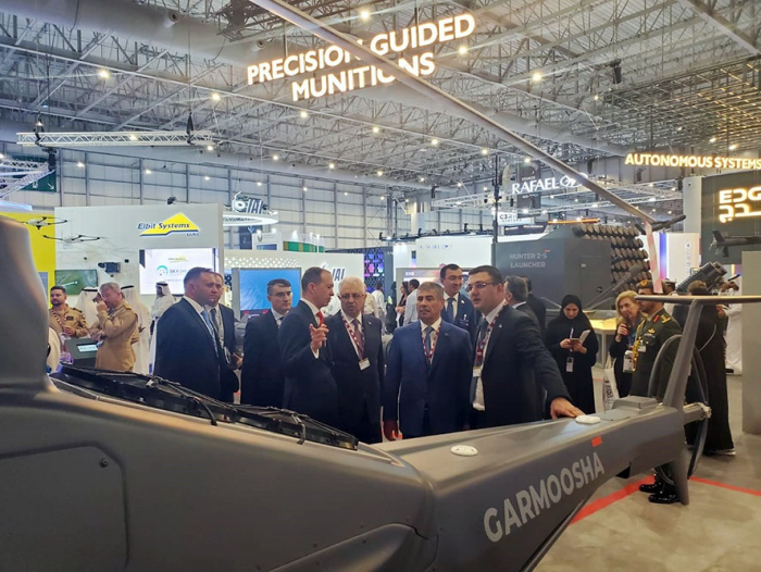  Azerbaijani defense minister views booth of UAE company 