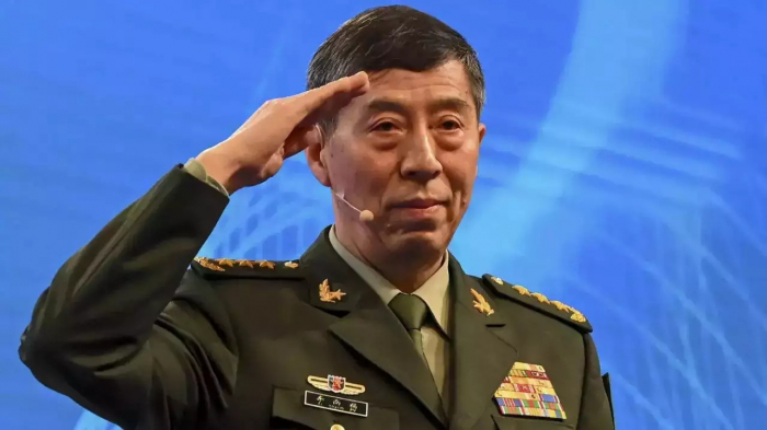 China appoints former navy commander as new defense minister