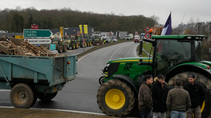   French farmers edge closer to Paris as protests ratchet up pressure on President Macron  