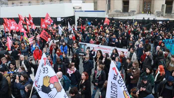   Protests erupt in Paris over immigration law  