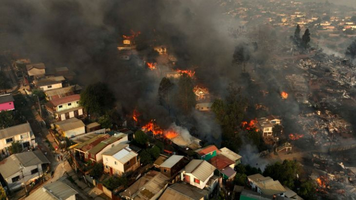 Raging forest fires in Chile kill at least 99