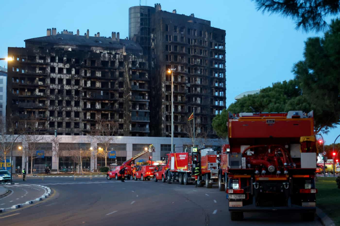 Spain tower block fire: Rescuers search for up to 15 missing people