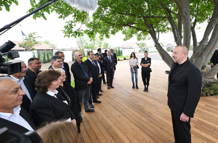  President Ilham Aliyev and First Lady Mehriban Aliyeva meet with residents relocated to Khojaly city 