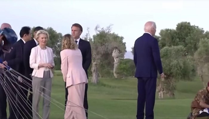  Biden wanders away at G7 summit before being pulled back by Italian PM  