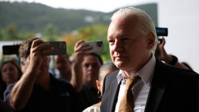 Julian Assange walks free after reaching plea deal in US court