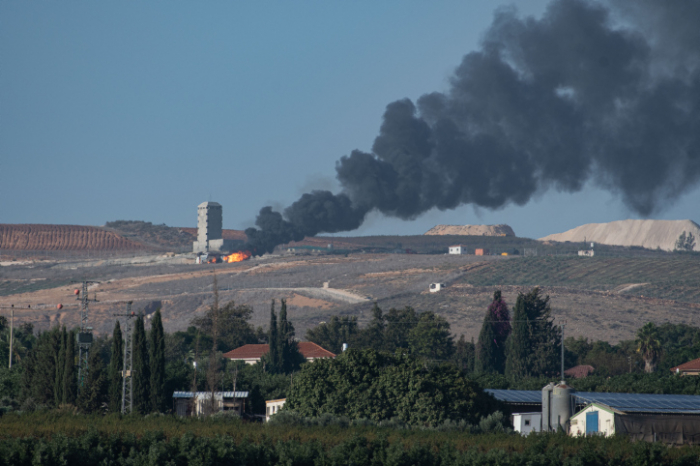 About 55 projectiles launched at Israel from Lebanon, fires break out