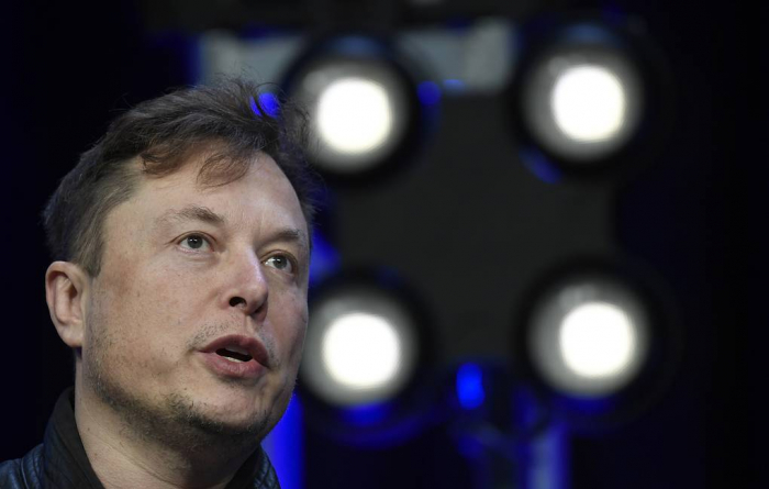 Musk hits back after being shunned from UK summit