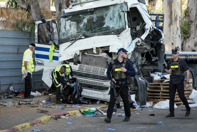   Dozens injured after truck hits bus stop in central Israel  