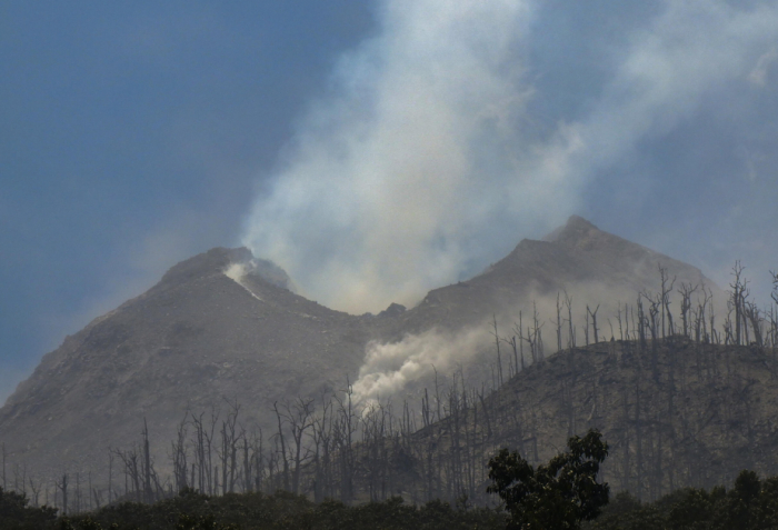 Indonesia volcano eruption kills 10, sets villages aflame