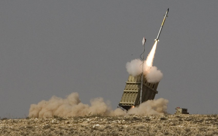 Israeli air force, navy attack Syrian air defenses