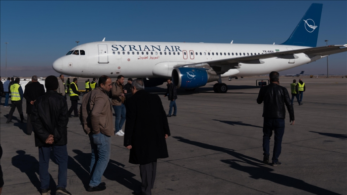 1st flight departs Damascus International Airport after Assad