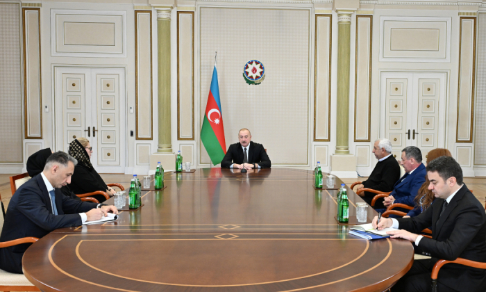  President Ilham Aliyev meets families of crew members killed in plane crash and surviving flight attendants 