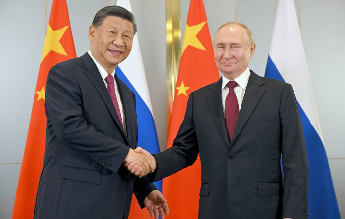 Putin, Xi discuss their countries’ relations with US, says Kremlin aide