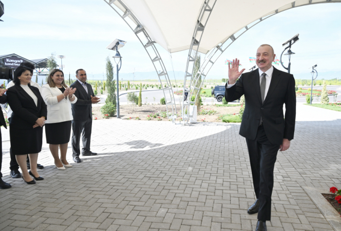 President Ilham Aliyev met with residents who moved to Kangarli village in Aghdam and presented them with keys to their new homes