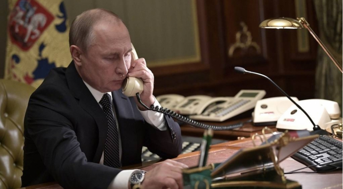 Putin Trampla danışıb  
