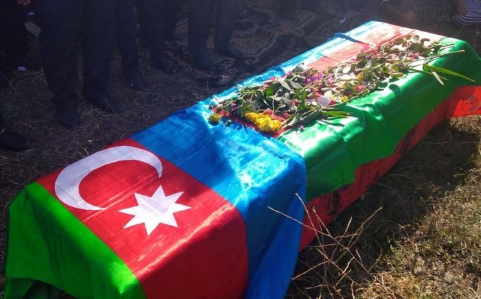 Daha bir itkin şəhidin qalıqları torpağa tapşırılıb
