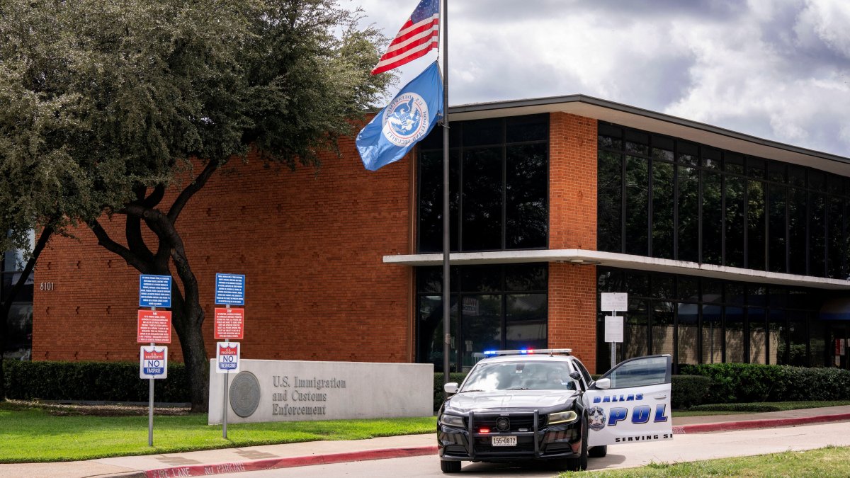 Motive unclear as gunman kills 1, wounds 2 at Dallas ICE facility