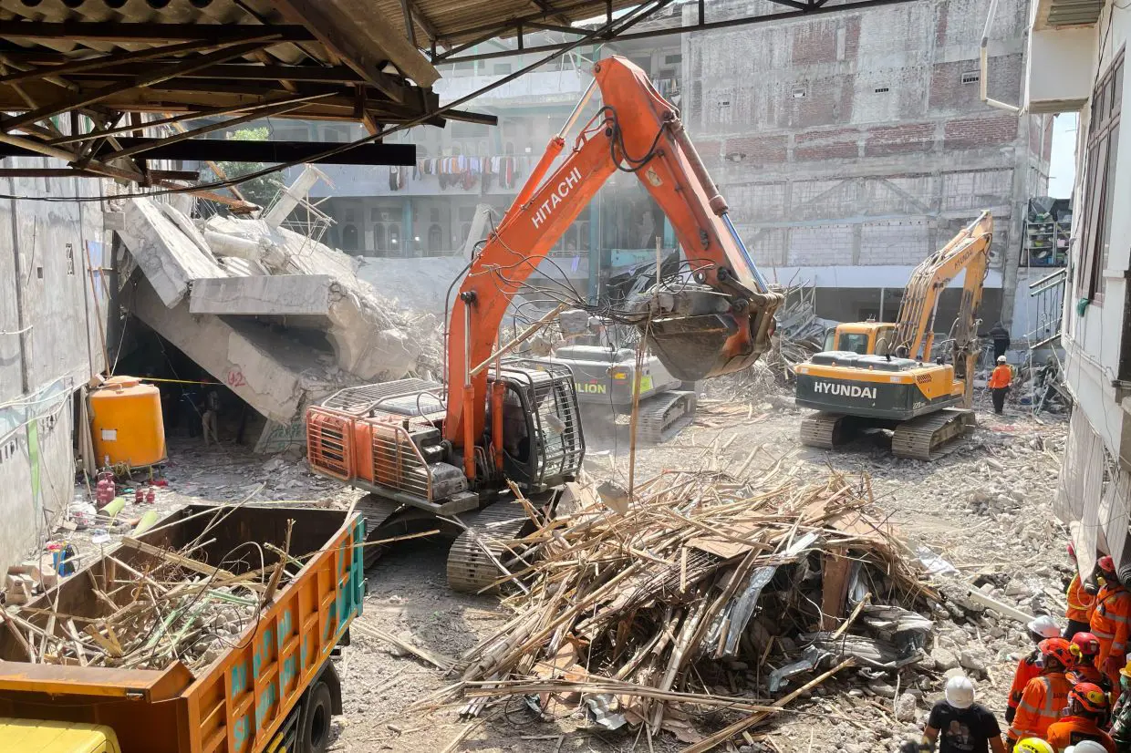Death toll from Indonesia school collapse rises to 63