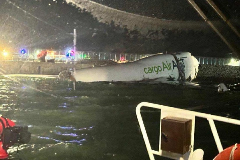 Two dead after Emirates plane veers off Hong Kong runway into sea