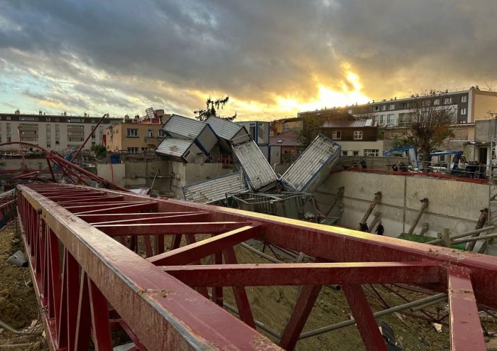 One dead after rare tornado topples construction cranes near Paris