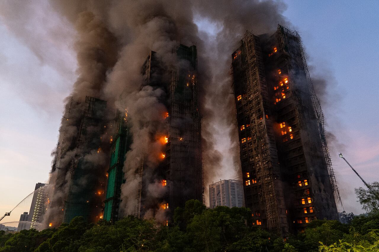   Four dead after fire engulfs residential high-rise buildings in Hong Kong  