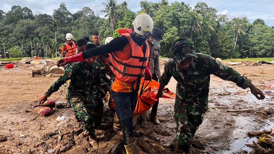   Aerial footage shows destruction left by floods and landslides that killed over 400 in Indonesia -   NO COMMENT    